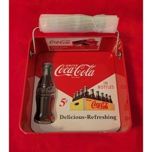 Coca-Cola Napkin Holder. Bottle Hand Grip Red Retro Look Delicious Refreshing